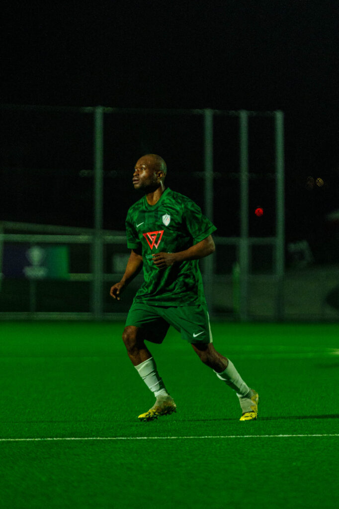 Tawanda Marowa for Bay Olympic FC runs during a football game.